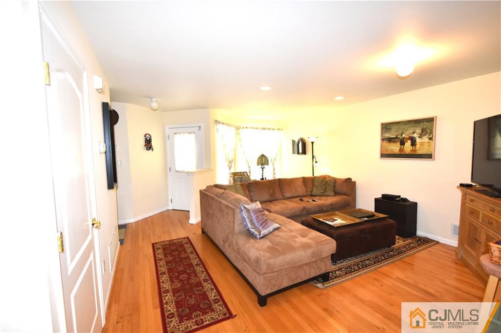 248 Hawthorne Road North Brunswick, NJ 08902 - Photo 2 of 24 a living room with furniture and a rug