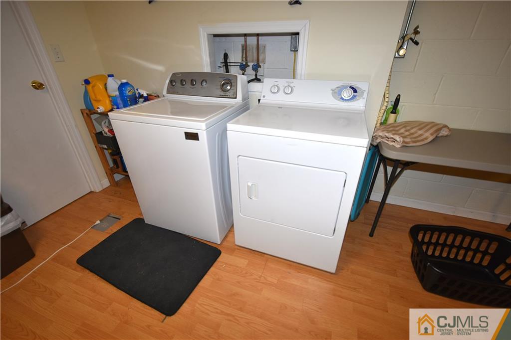 248 Hawthorne Road North Brunswick, NJ 08902 - Photo 24 of 24 a view of utility room with washer and dryer
