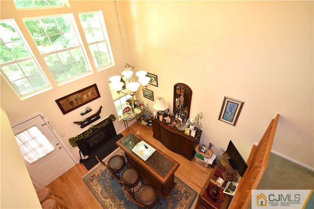 248 Hawthorne Road North Brunswick, NJ 08902 - Photo 4 of 24 a view of living room with furniture and a flat screen tv