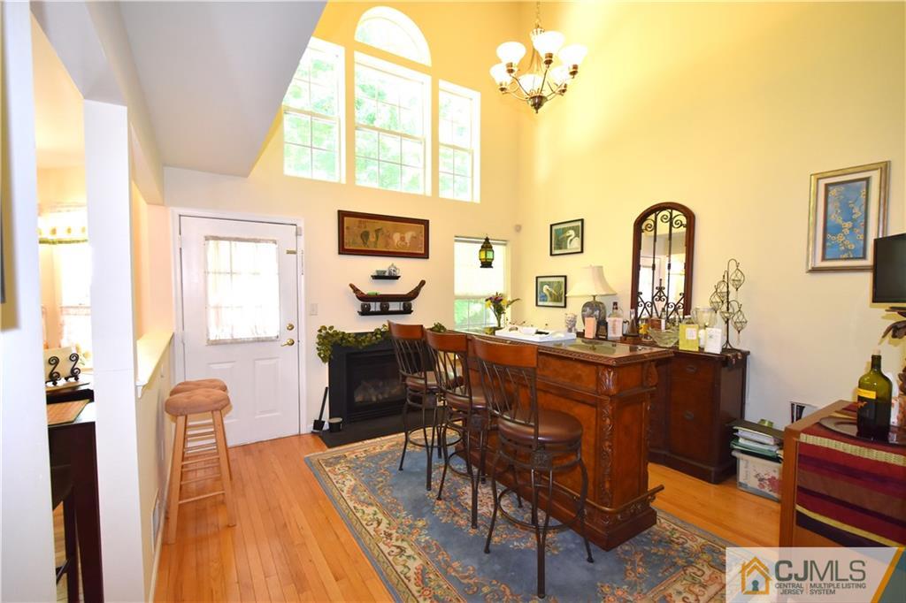 248 Hawthorne Road North Brunswick, NJ 08902 - Photo 7 of 24 a living room with furniture and a window