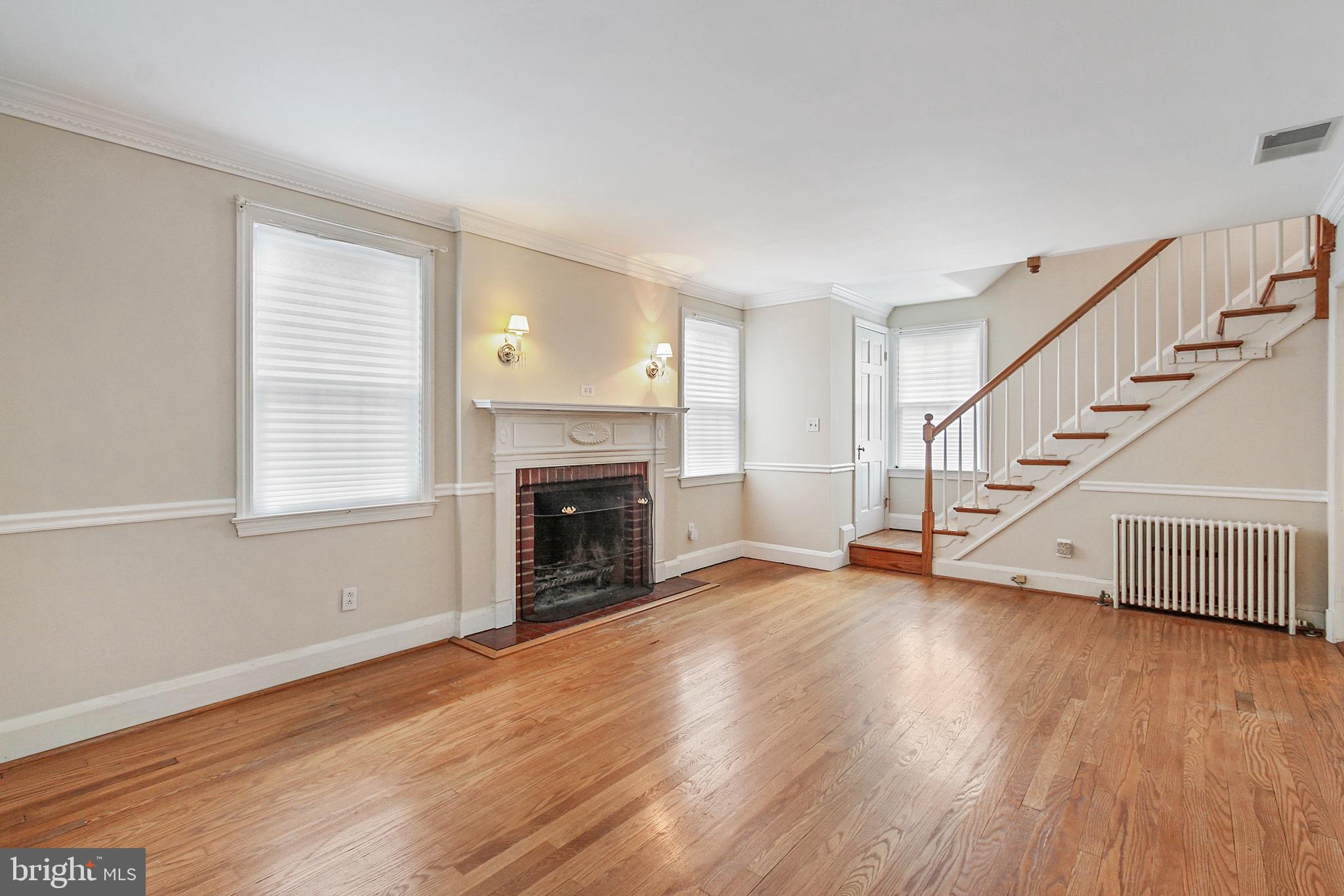 611 Overbrook Road Baltimore, MD 21212 - Photo 3 of 27 Original wood floors, working wood fireplace!