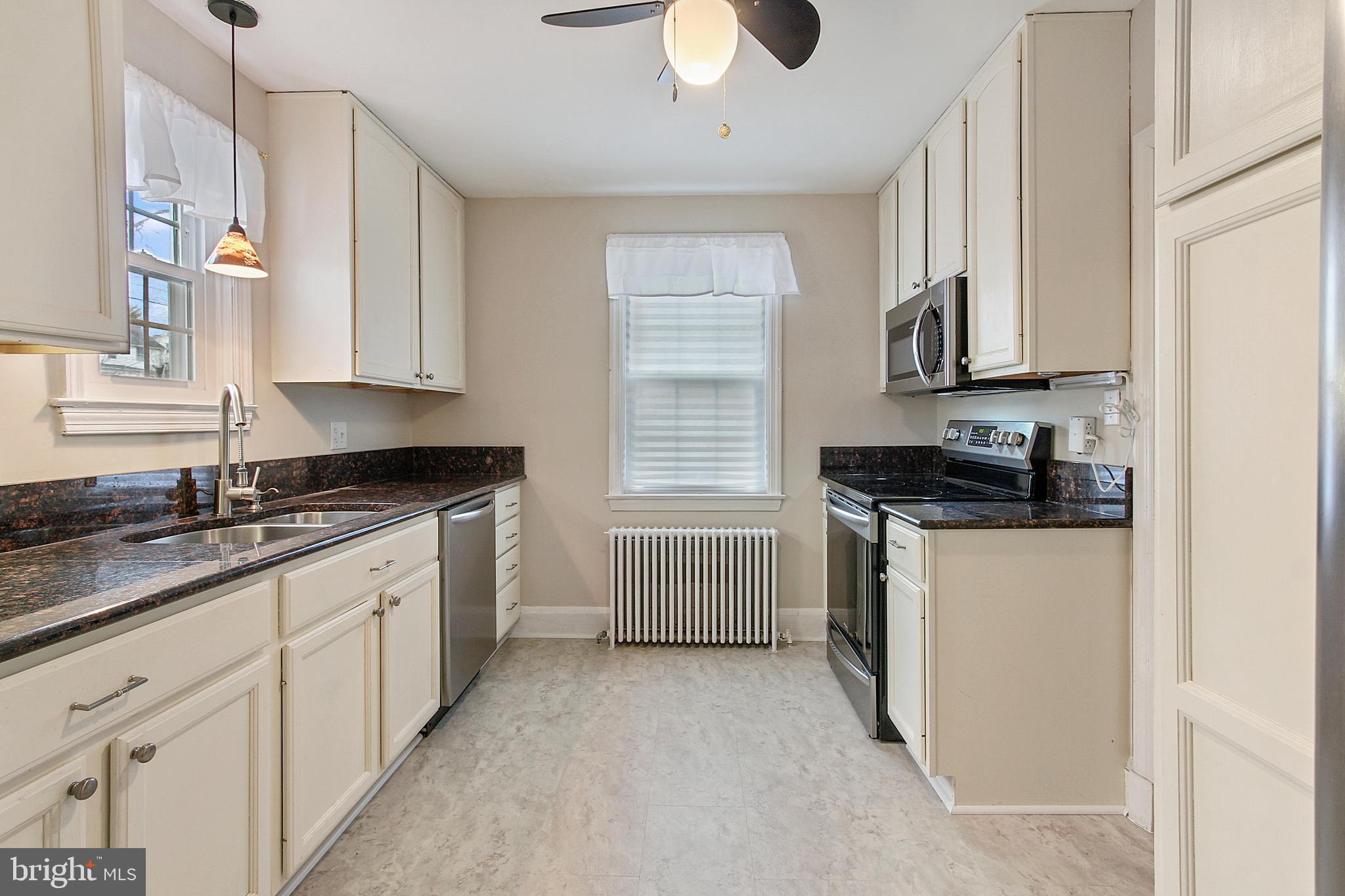 611 Overbrook Road Baltimore, MD 21212 - Photo 8 of 27 Kitchen with all new appliances and flooring!