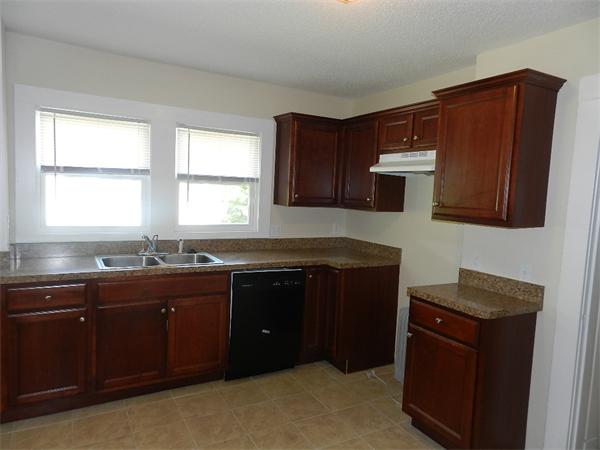 196 Pasco Road Springfield, MA 01151 - Photo 8 of 19 a kitchen with a sink and a stove