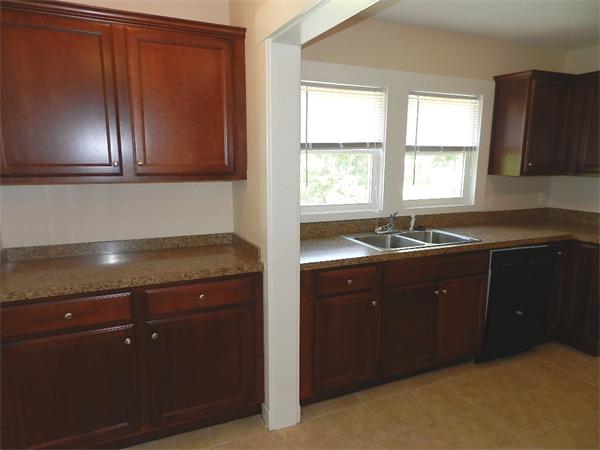 196 Pasco Road Springfield, MA 01151 - Photo 9 of 19 a kitchen with a sink and cabinets