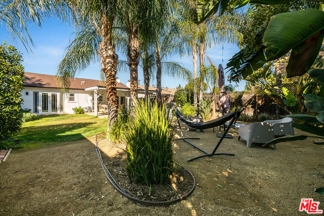 6660 Amigo Avenue Reseda, CA 91335 - Photo 17 of 25 a view of a yard in front of the house