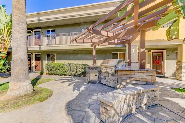 a view of a building with sitting area