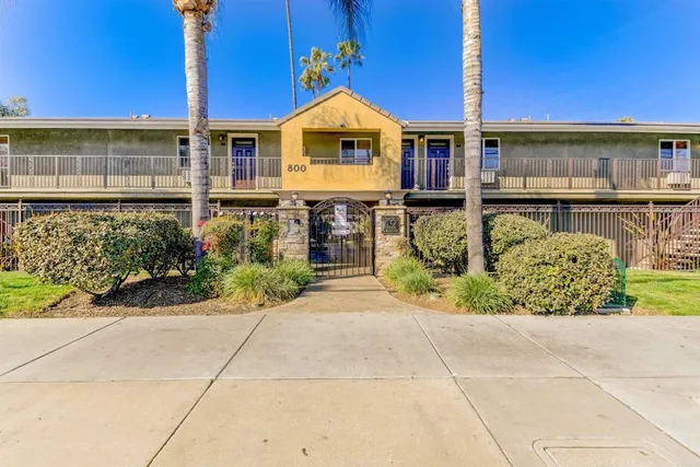 a front view of a building with garden