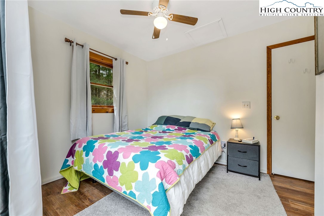 508 Curly Q Drive Crumpler, NC 28617 - Photo 29 of 39 a bedroom with a bed and hallway