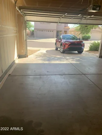 a view of storage and utility room with empty racks