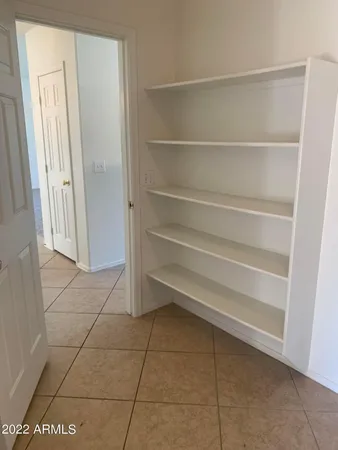 a view of a room with storage racks