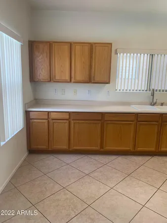 a large kitchen with a cabinets