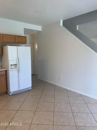 a kitchen with a stove top oven cabinets and stainless steel appliances