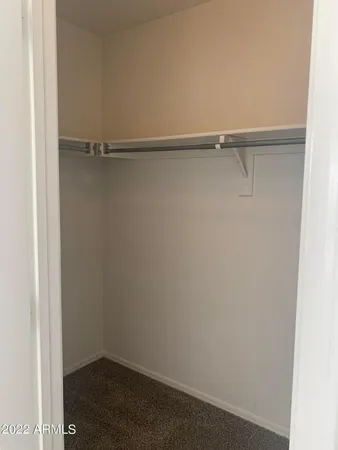 a view of a room with rack on the wall