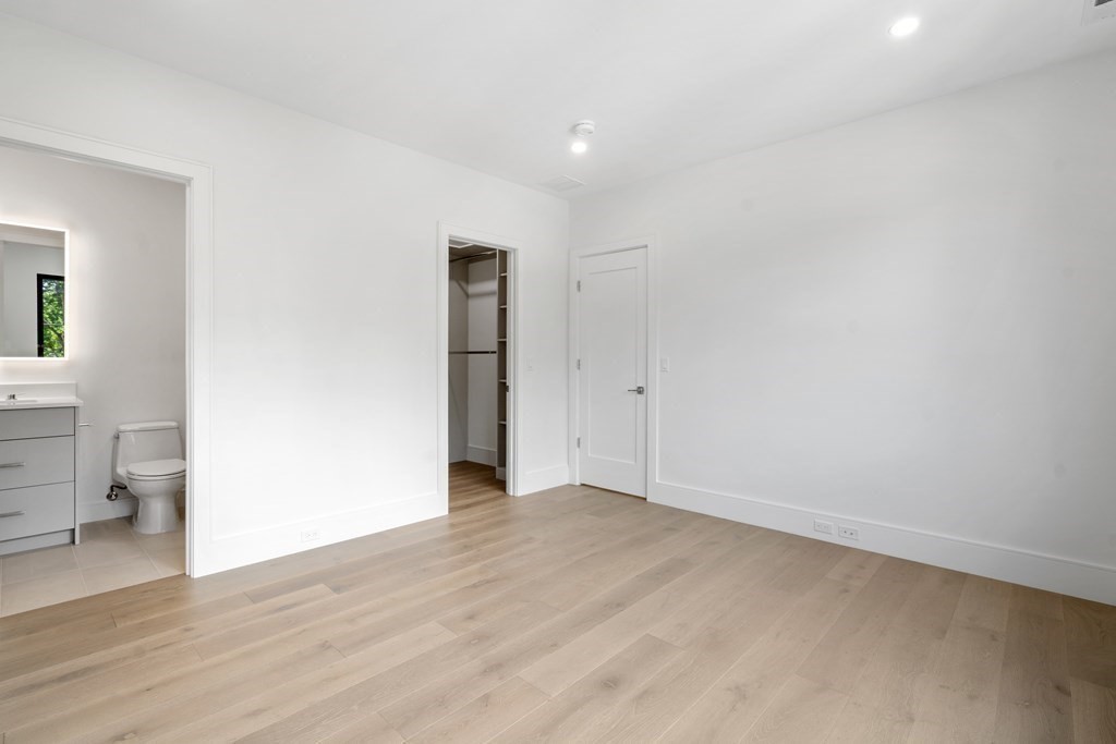 55 Rosalie Road Newton, MA 02459 - Photo 30 of 42 a view of an empty room with a window