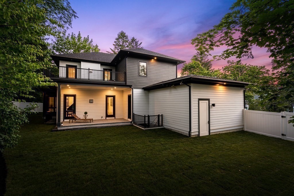 55 Rosalie Road Newton, MA 02459 - Photo 40 of 42 a front view of a house with a garden