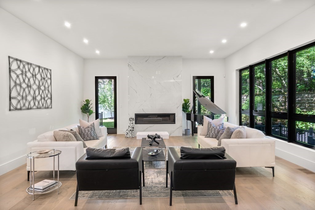 55 Rosalie Road Newton, MA 02459 - Photo 7 of 42 a living room with furniture and a large window