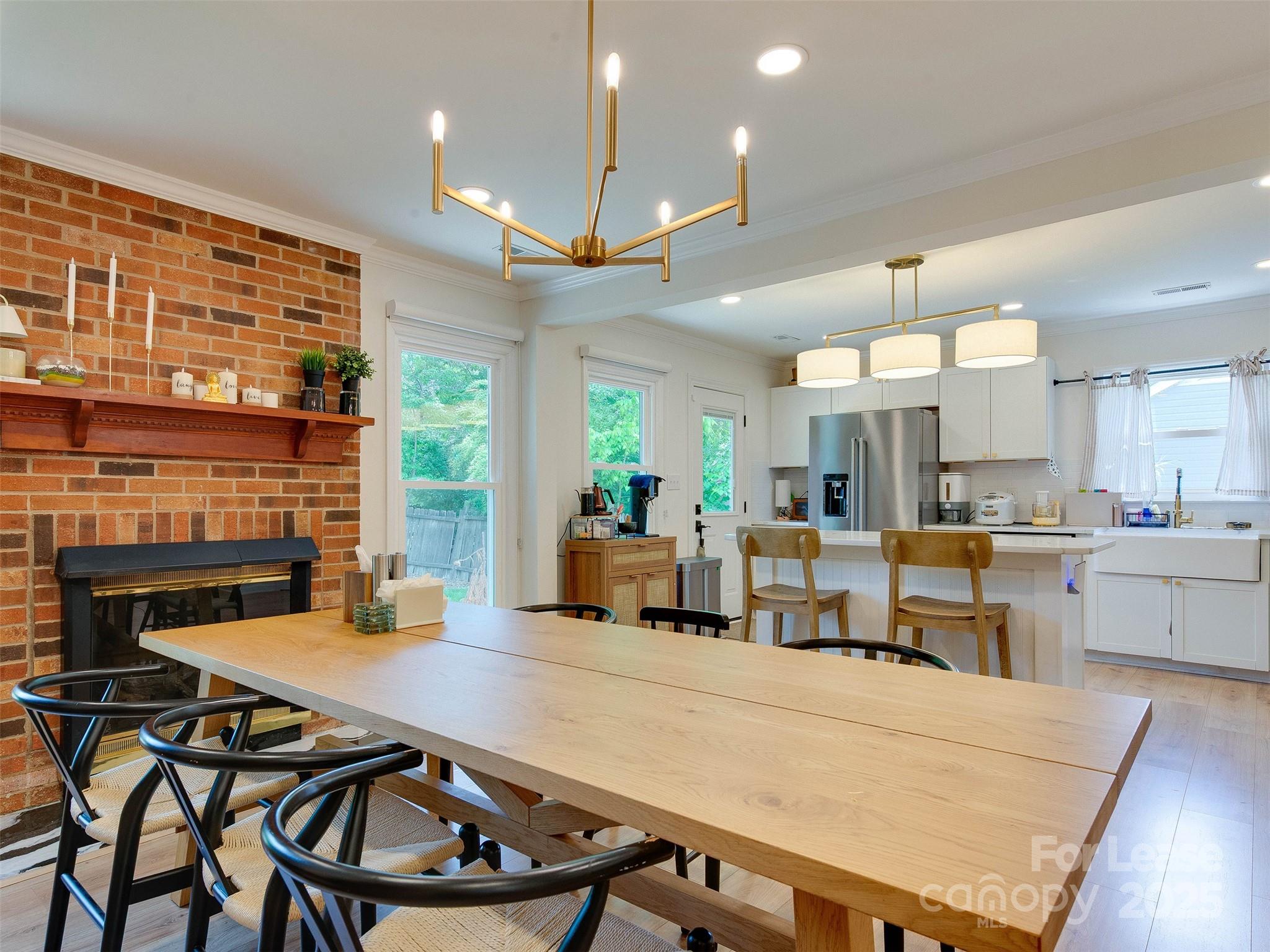 619 Fence Post Lane Matthews, NC 28105 - Photo 25 of 47 a living room with stainless steel appliances kitchen island granite countertop furniture and a kitchen view