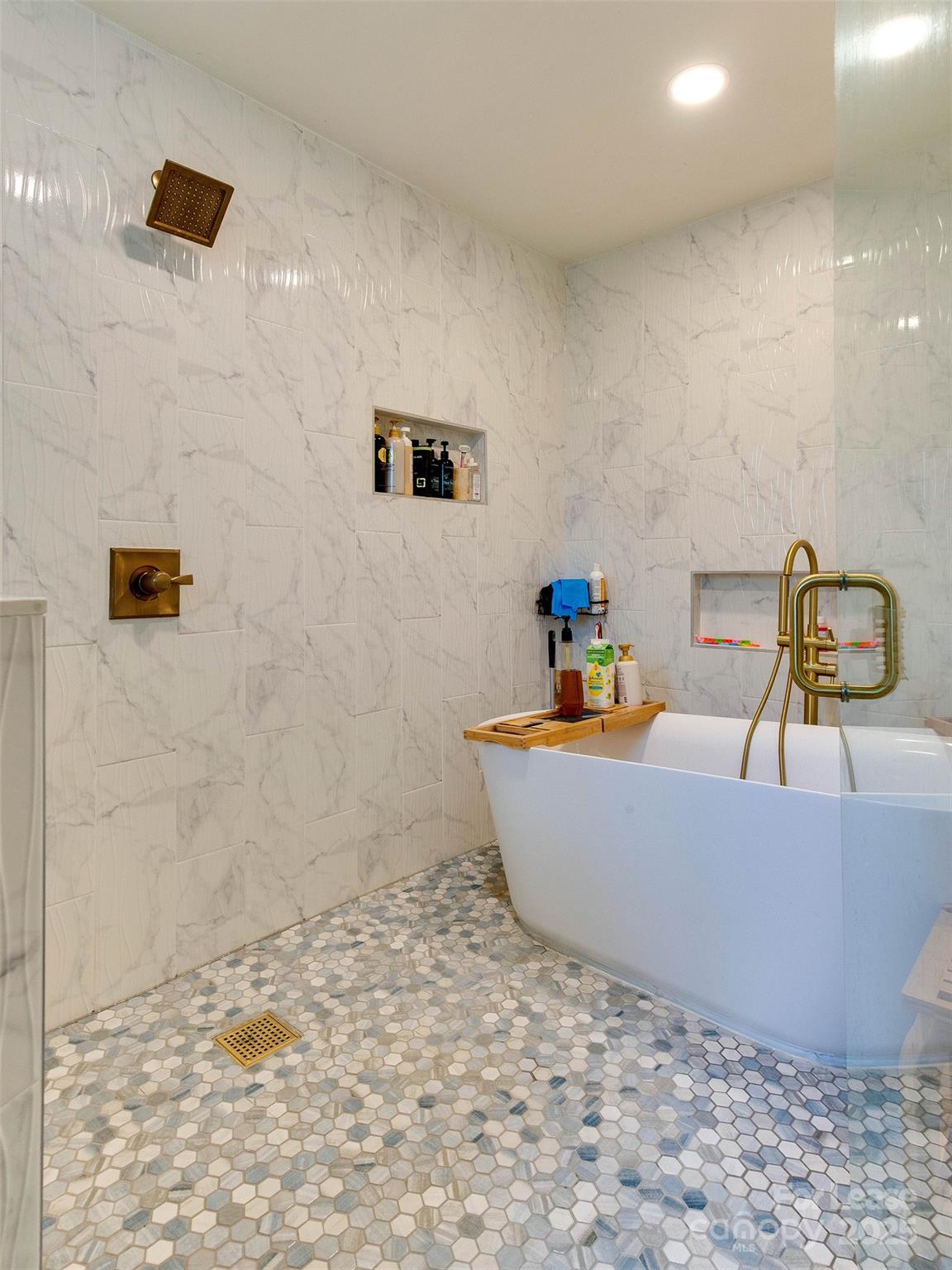 619 Fence Post Lane Matthews, NC 28105 - Photo 35 of 47 a view of a bathtub in a bathroom