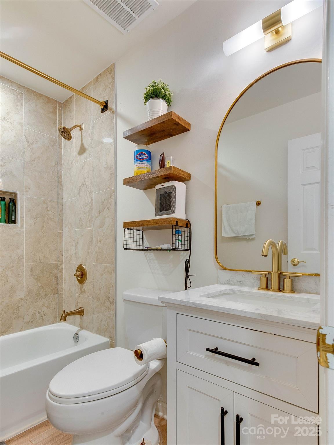 619 Fence Post Lane Matthews, NC 28105 - Photo 39 of 47 a bathroom with a granite countertop toilet sink and mirror