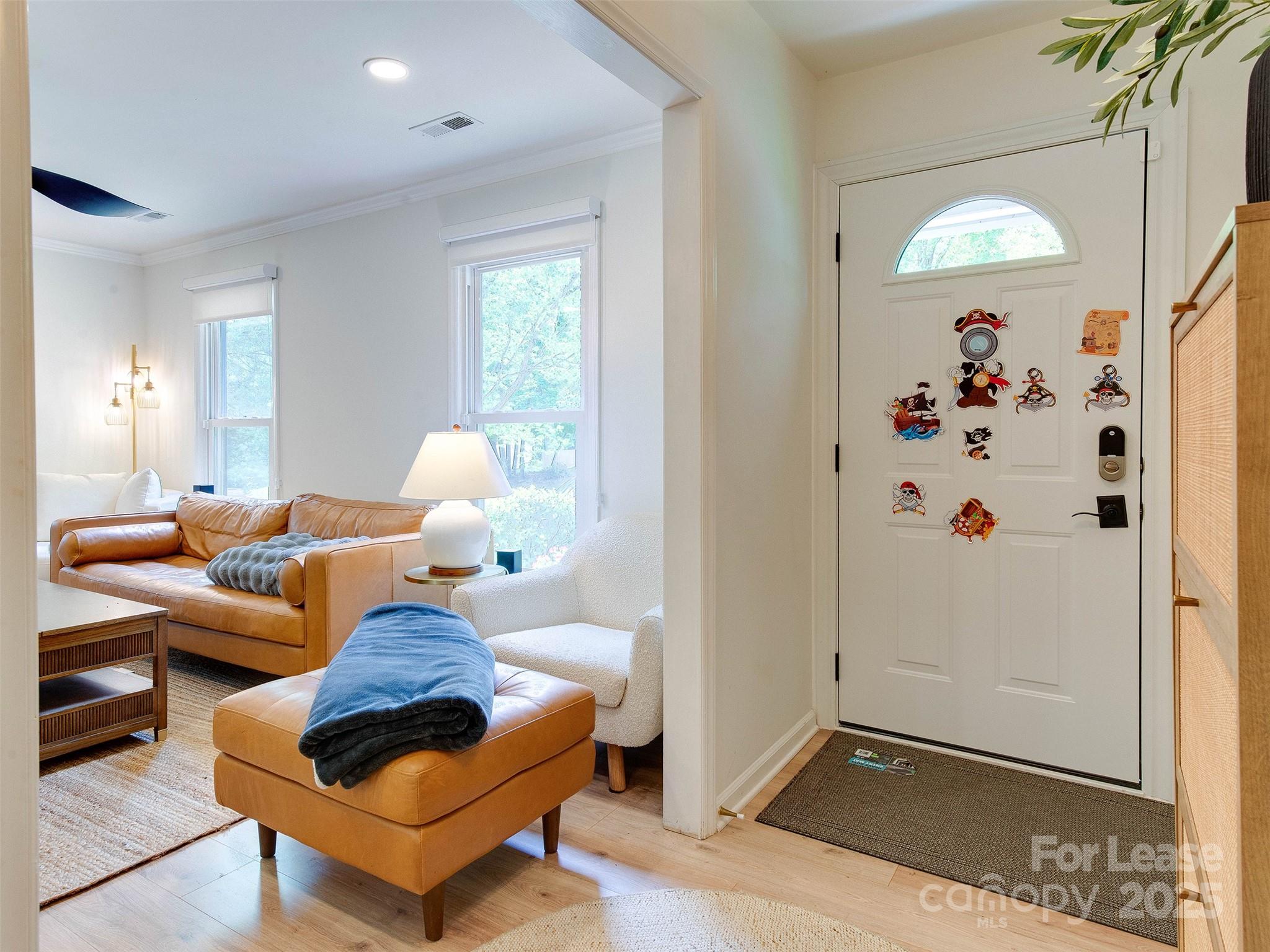 619 Fence Post Lane Matthews, NC 28105 - Photo 5 of 47 a living room with furniture and a window