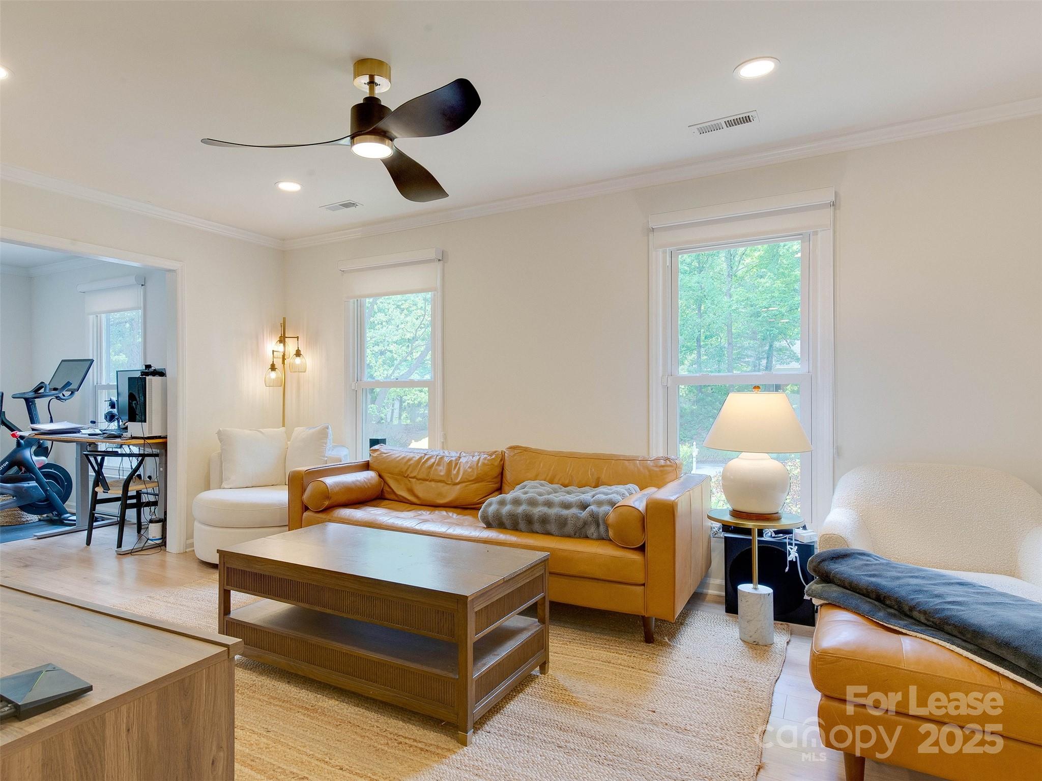 619 Fence Post Lane Matthews, NC 28105 - Photo 8 of 47 a living room with furniture and a lamp