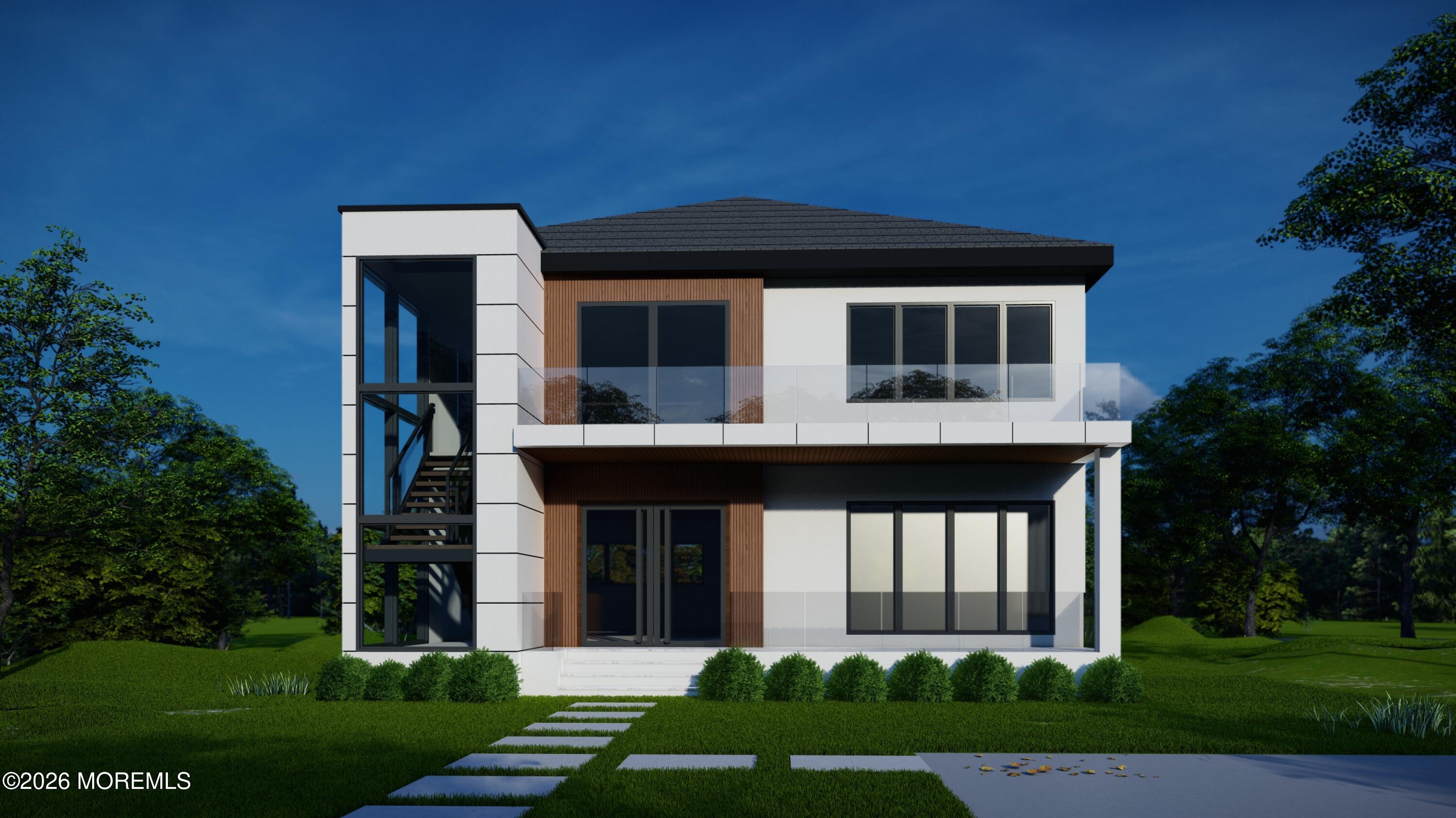 5 Royal Place Elberon, NJ 07740 - Photo 1 of 9 a front view of a house with garden