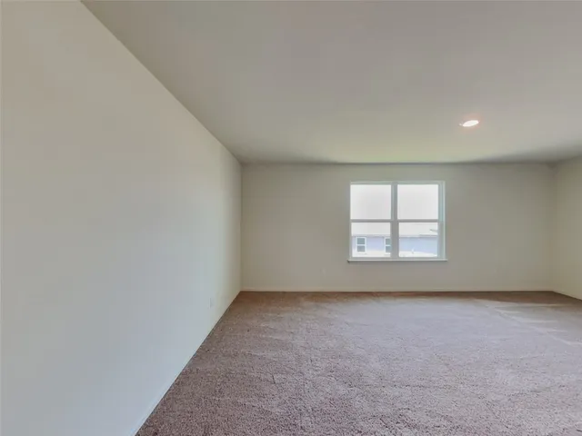 a view of a backyard of house with green space