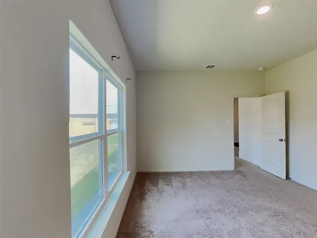 a white bath tub sitting in a bathroom