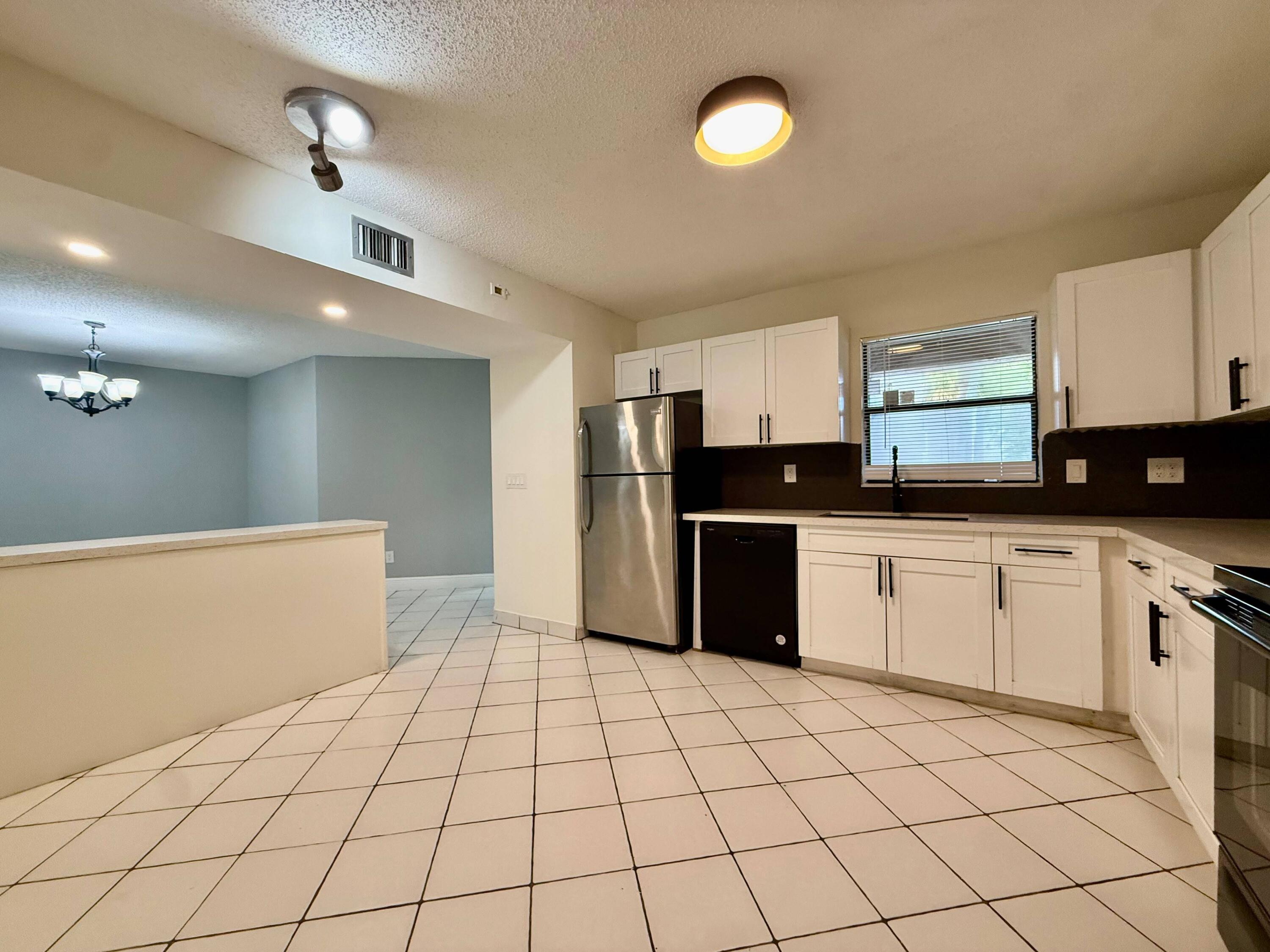 9633 Riverside Drive, Unit E2 Coral Springs, FL 33071 - Photo 12 of 14 WhatsApp Image 2026-06-24 at 23.43.26 (9