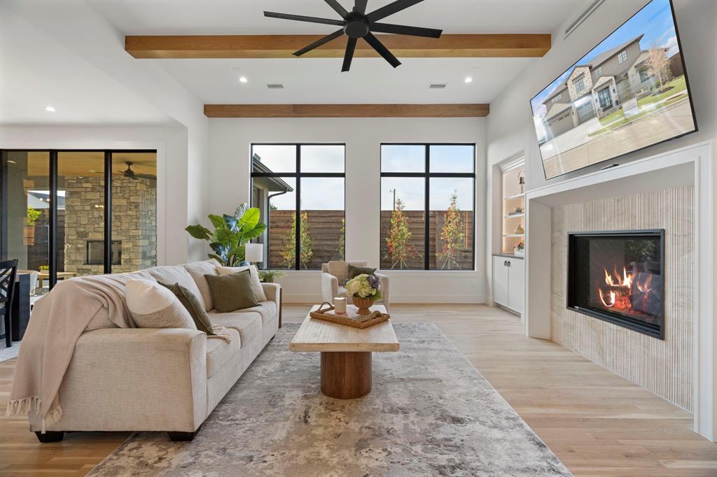 3316 Ferguson Road Grapevine, TX 76092 - Photo 5 of 39 a living room with furniture and a fireplace