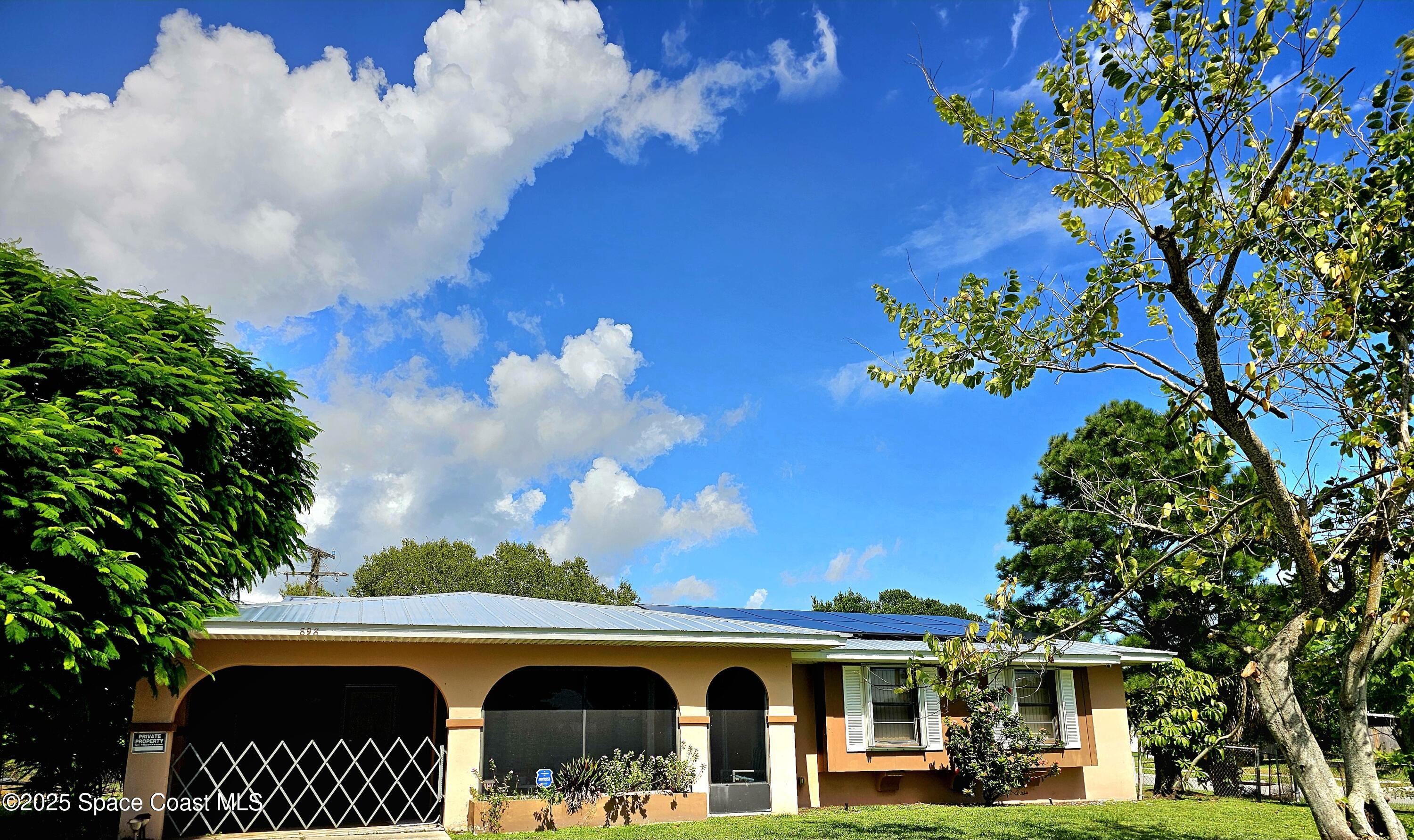 a view of swimming pool with outdoor seating