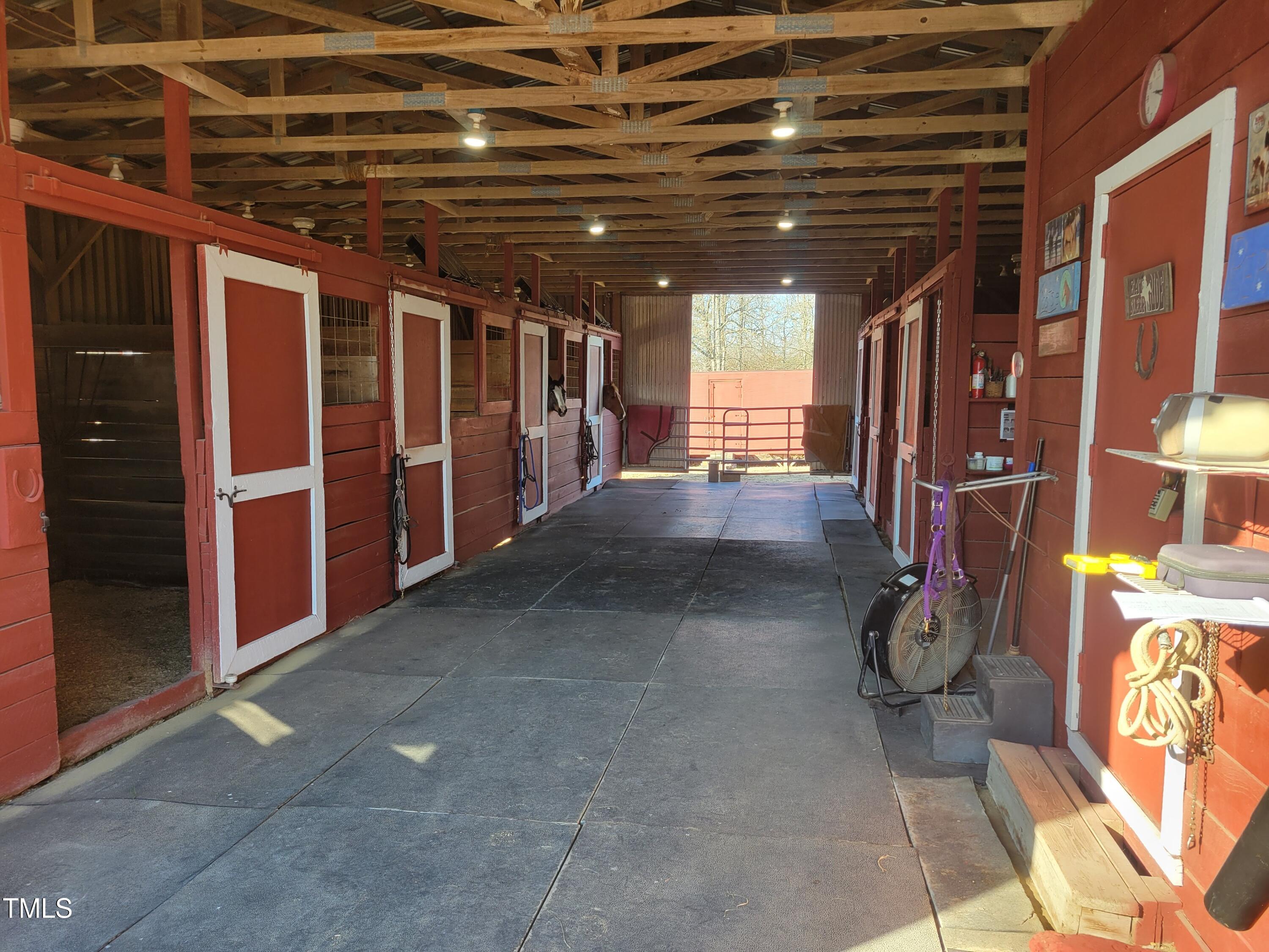 7027 Old 421 Road Julian, NC 27283 - Photo 20 of 72 a view of empty room with wooden floor