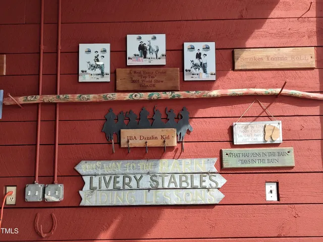 a view of a swimming pool with a yard