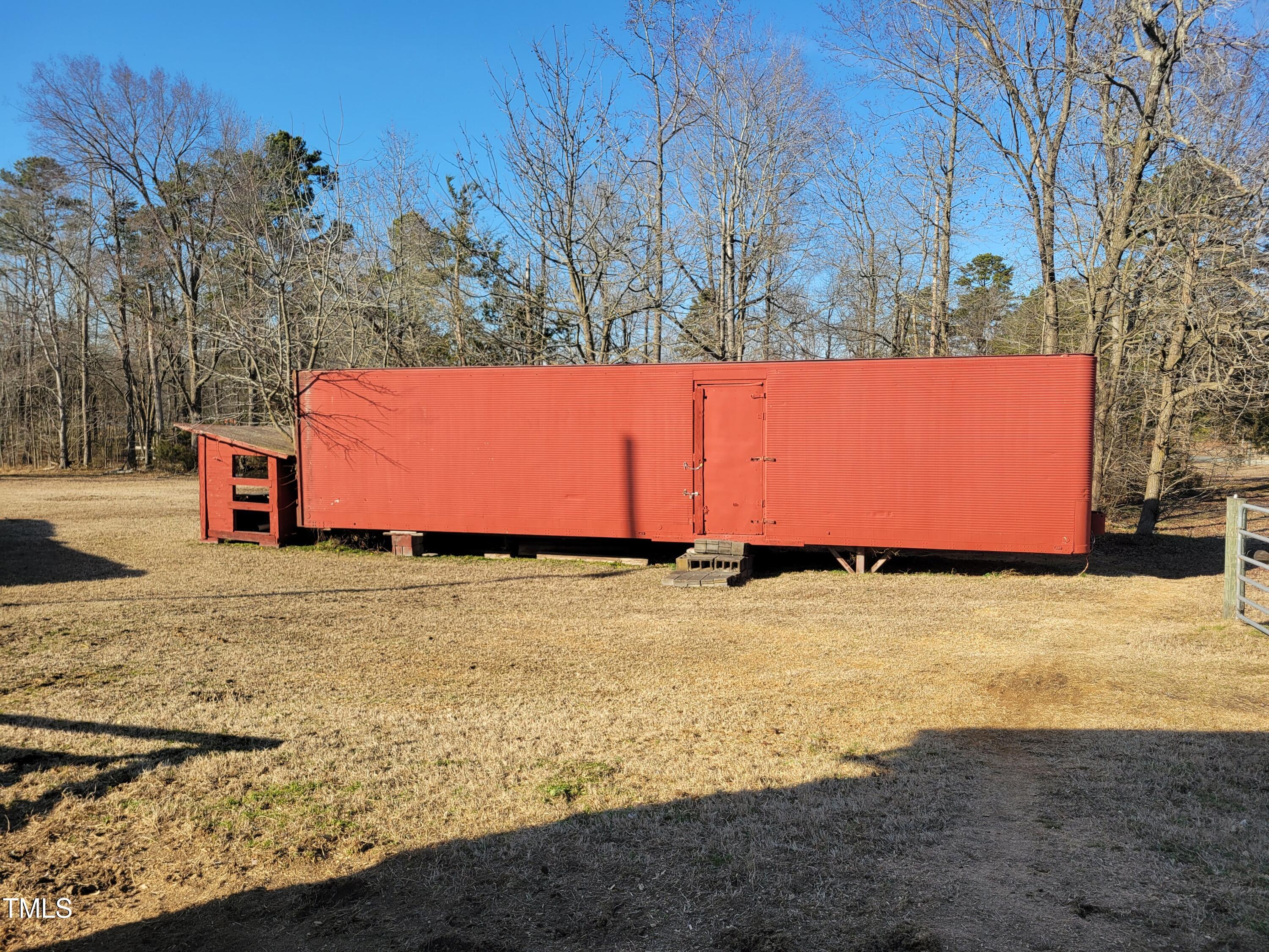 7027 Old 421 Road Julian, NC 27283 - Photo 30 of 72 a view of back yard of the house