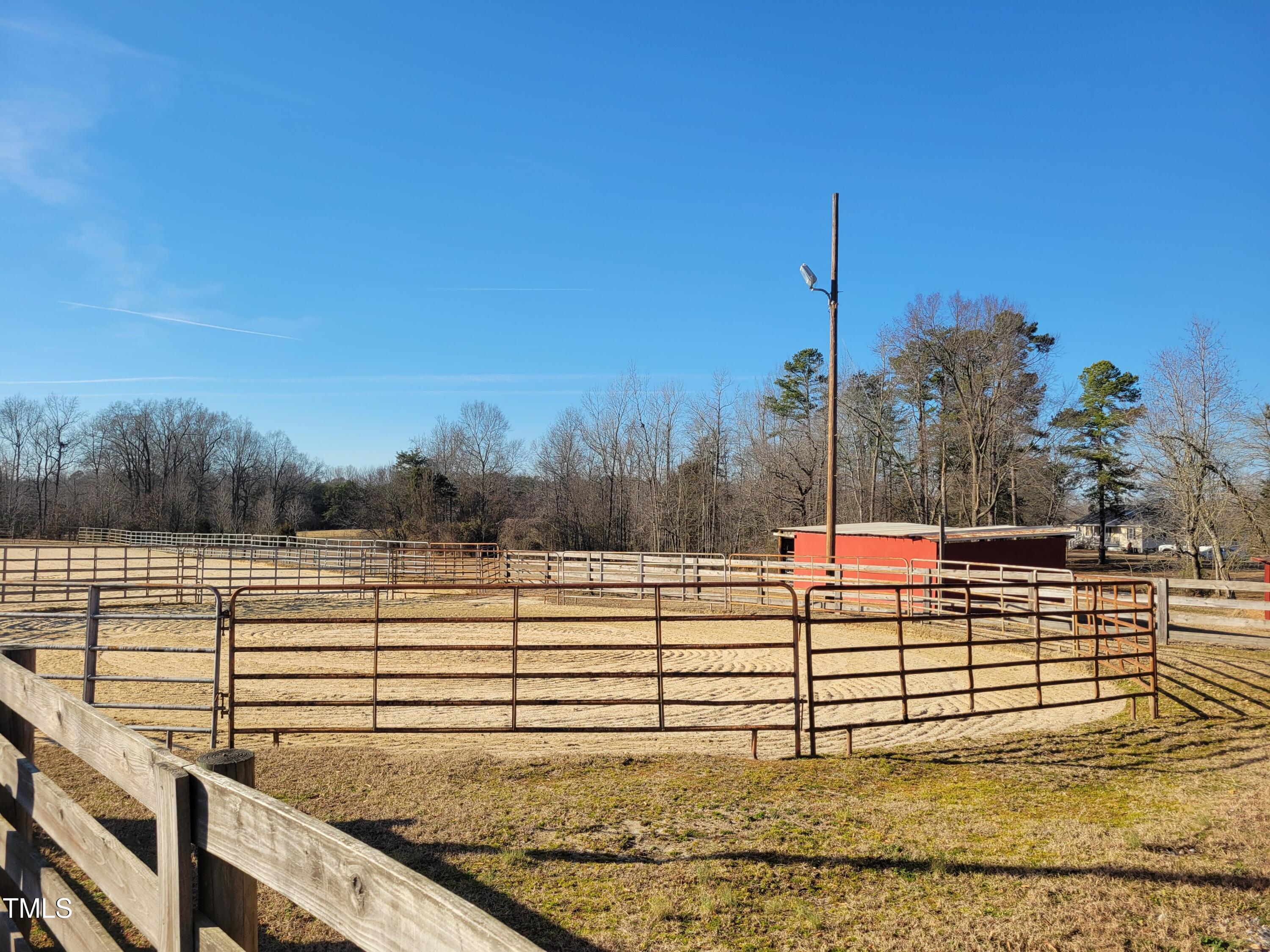 7027 Old 421 Road Julian, NC 27283 - Photo 32 of 72 a view of a terrace with a bench