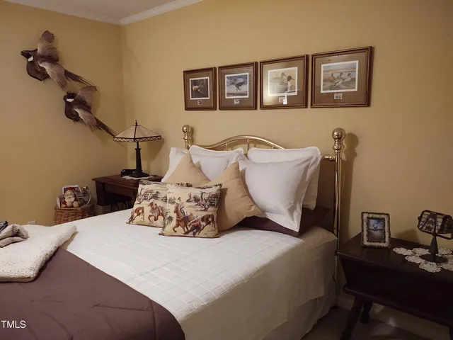 a view of a small yard with wooden fence