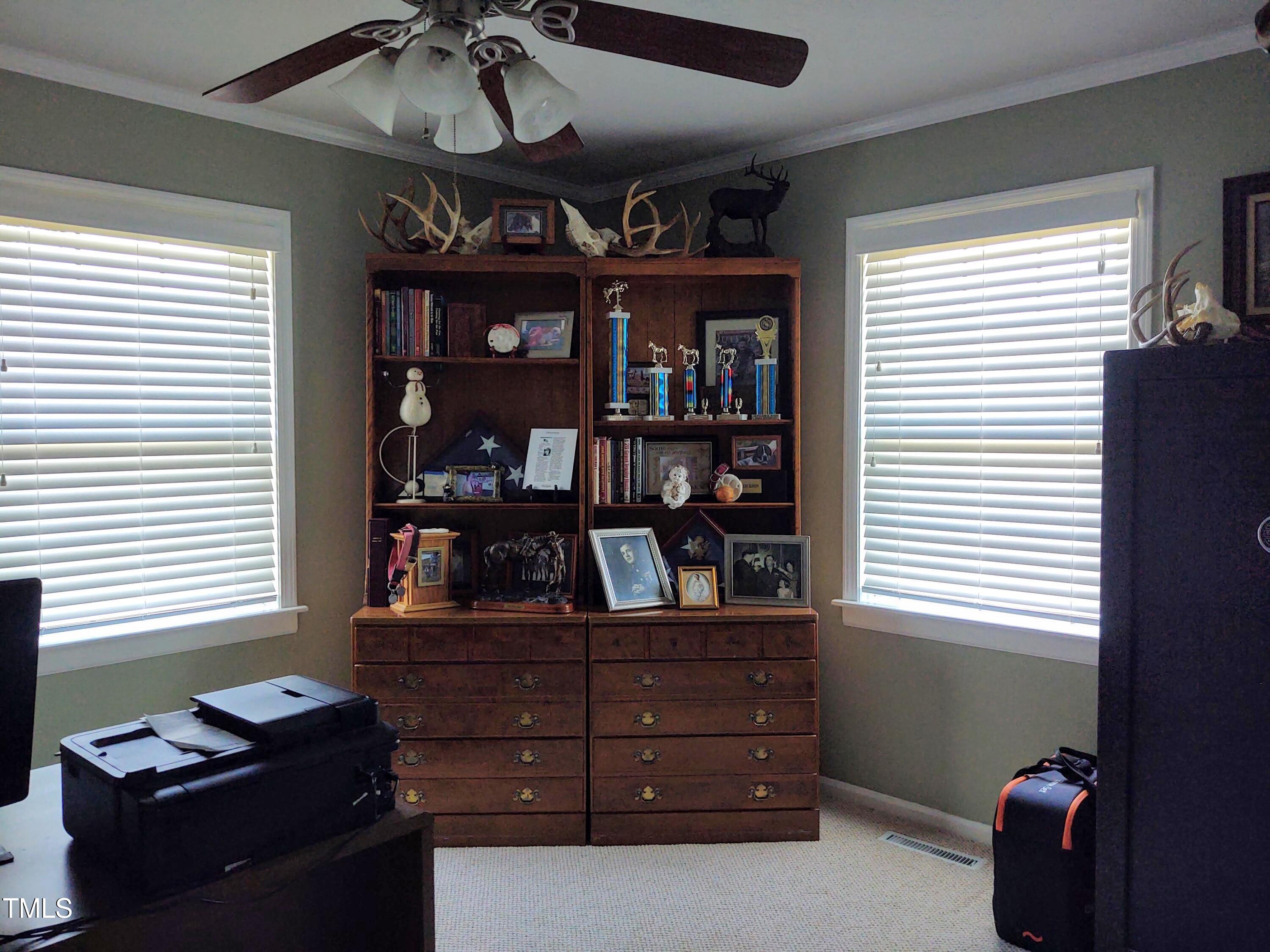 7027 Old 421 Road Julian, NC 27283 - Photo 53 of 72 a view of a workspace with furniture and windows
