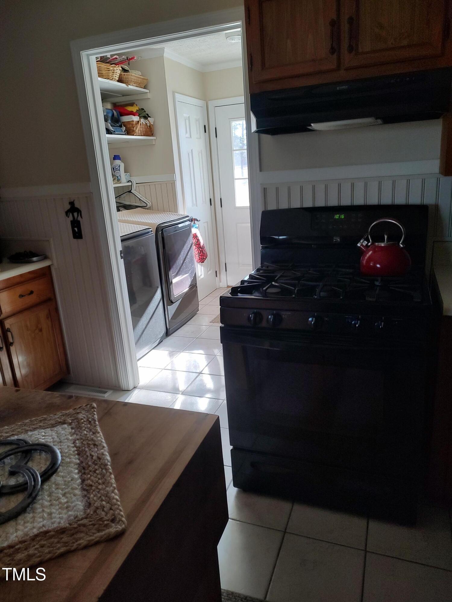 7027 Old 421 Road Julian, NC 27283 - Photo 57 of 72 a living room with furniture and a fireplace