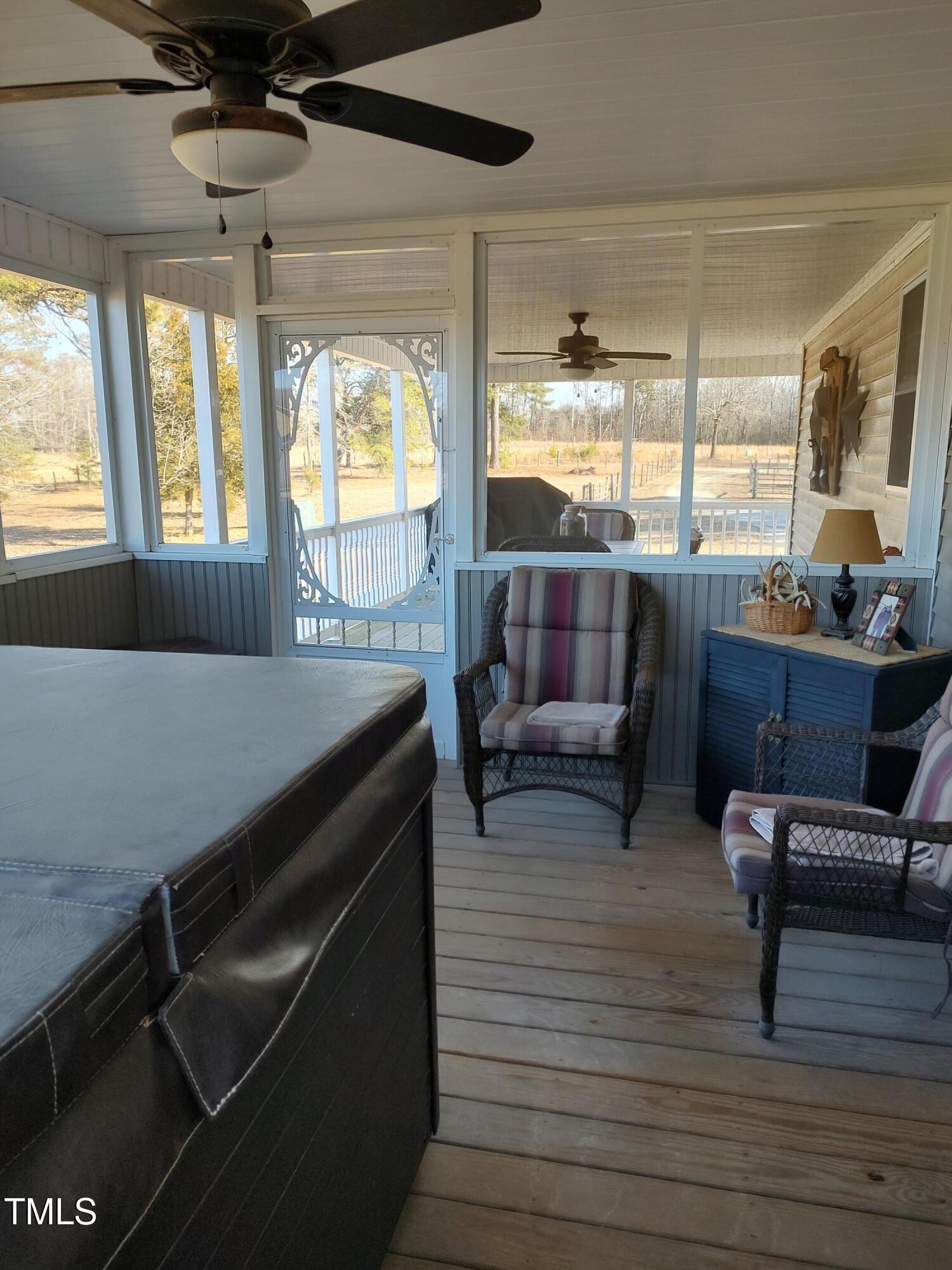 7027 Old 421 Road Julian, NC 27283 - Photo 64 of 72 a living room with furniture and a table