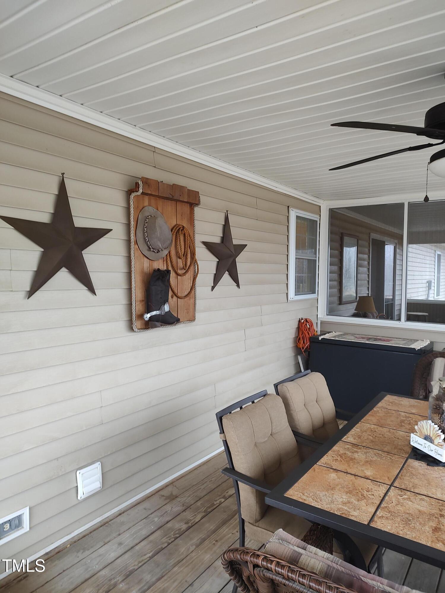 7027 Old 421 Road Julian, NC 27283 - Photo 66 of 72 a living room with couch and wooden floor