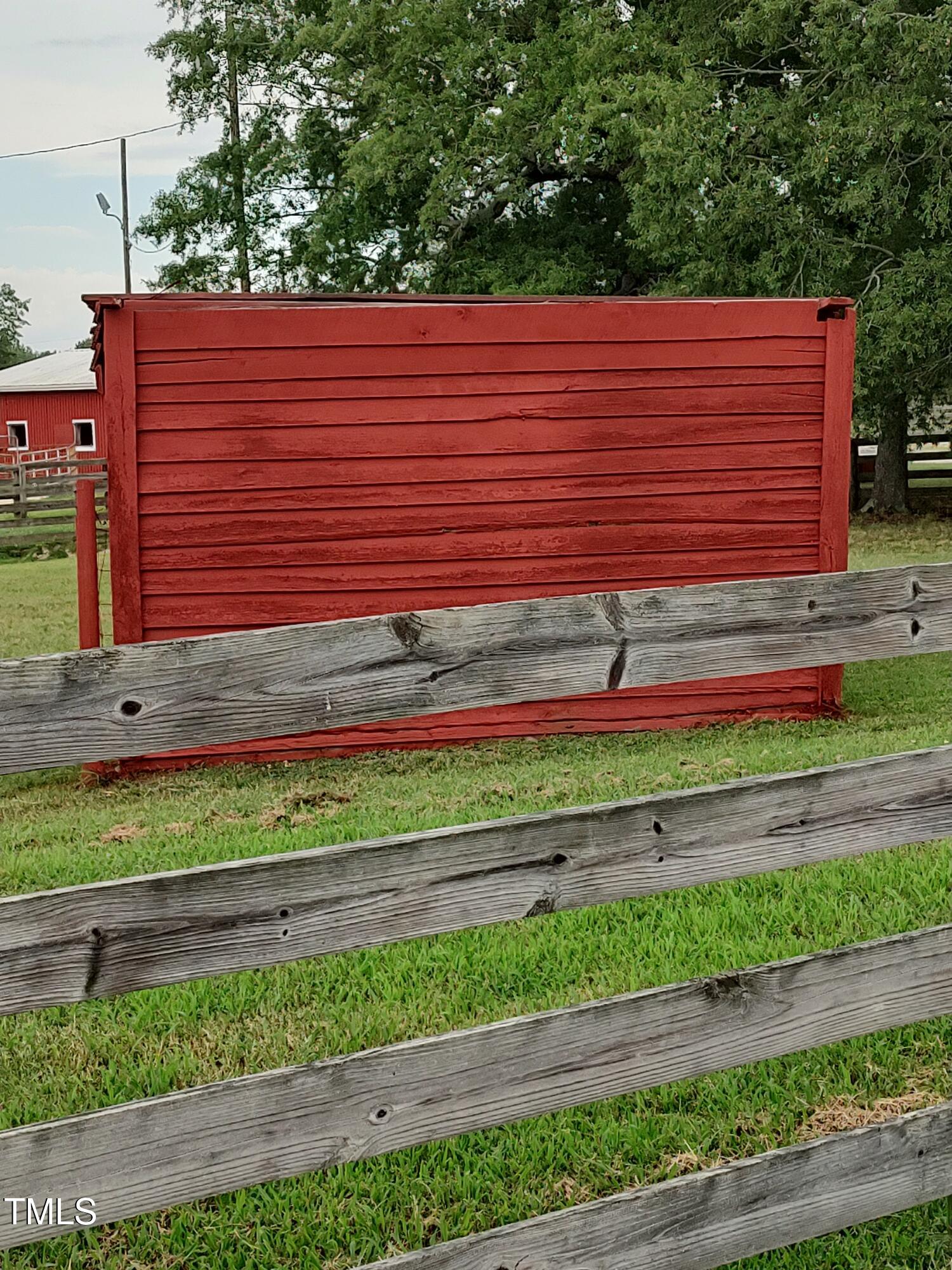 7027 Old 421 Road Julian, NC 27283 - Photo 68 of 72 a view of a small yard with wooden fence