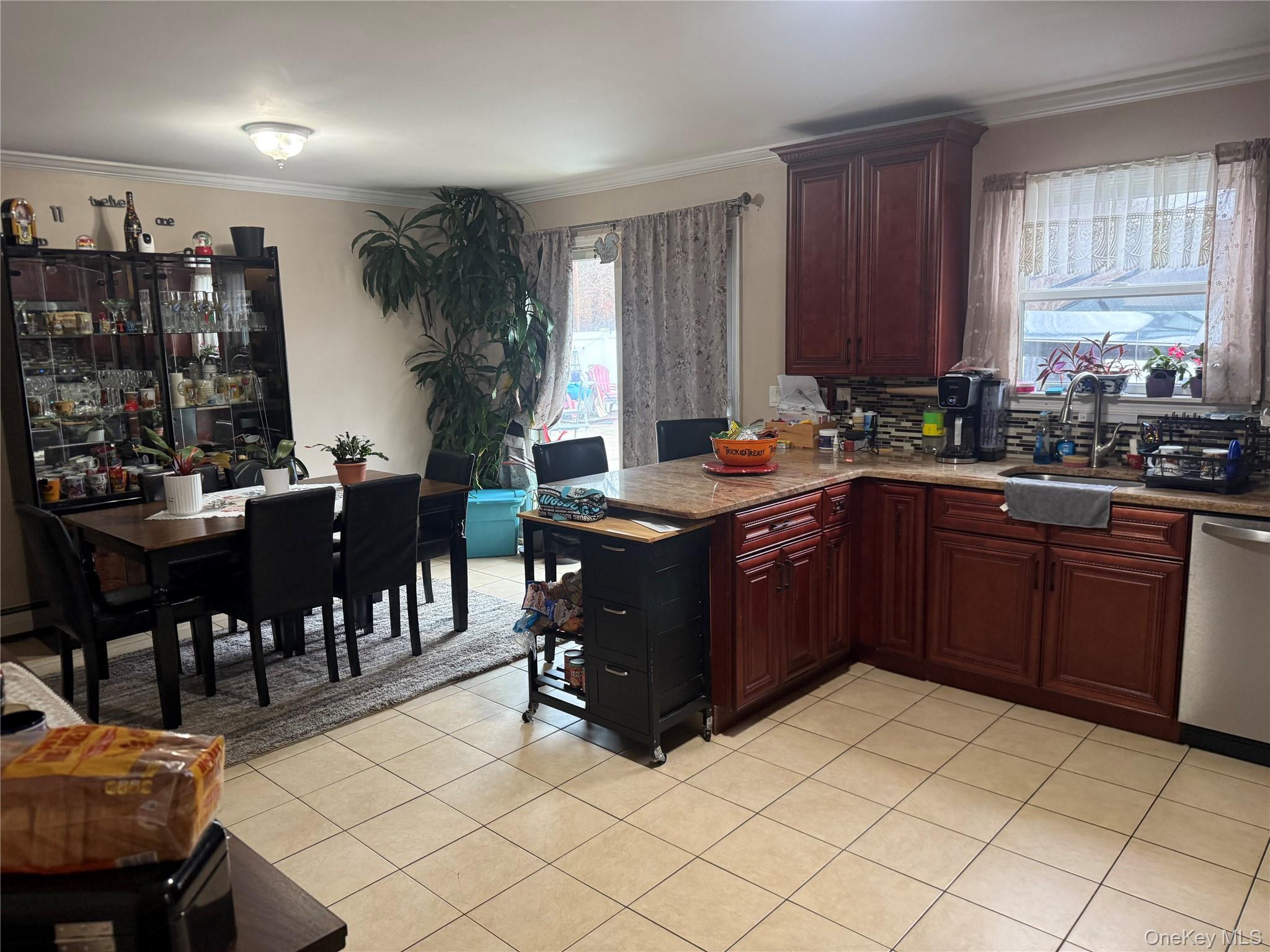 2 1st Street Coram, NY 11727 - Photo 18 of 36 a kitchen with a sink a counter top space and appliances