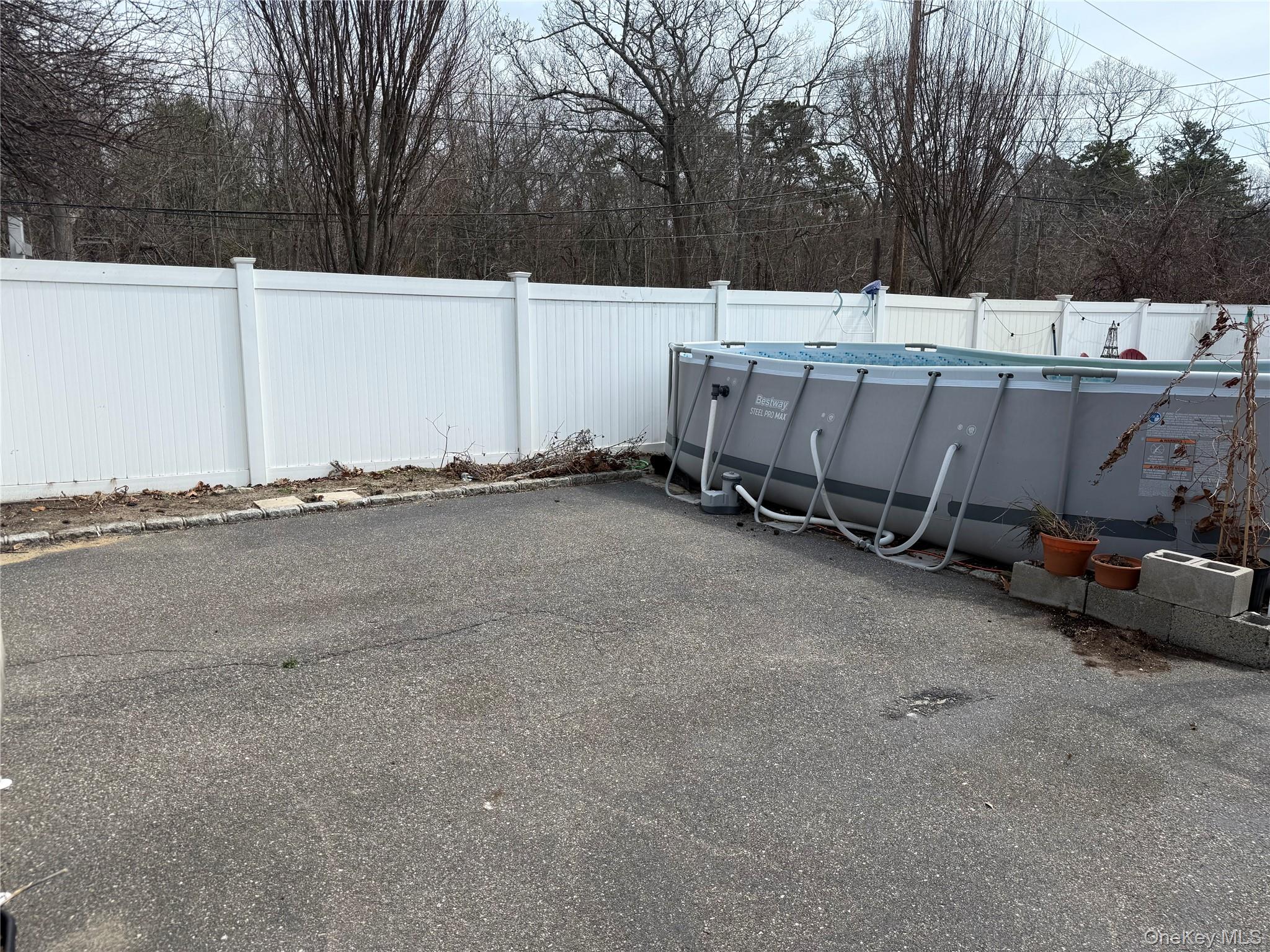 2 1st Street Coram, NY 11727 - Photo 8 of 36 a view of a backyard of the house