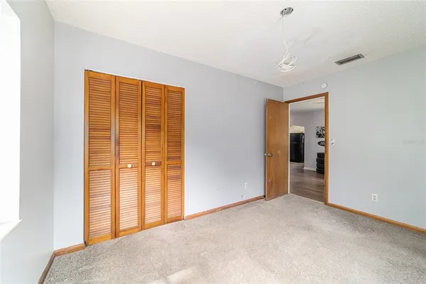 a view of a room with an entryway