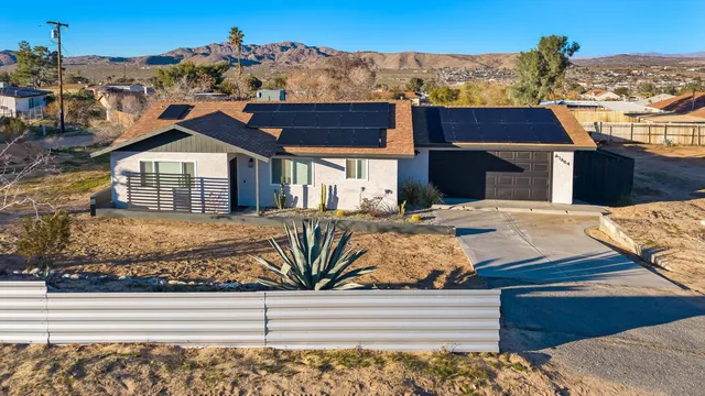 a view of a house with a terrace