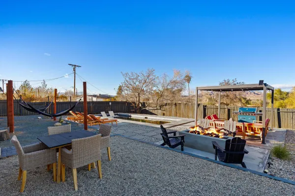 a view of a terrace with furniture