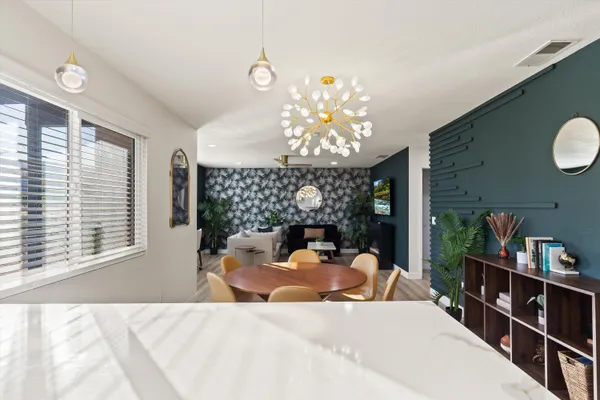 a bed room with a bed and a large window
