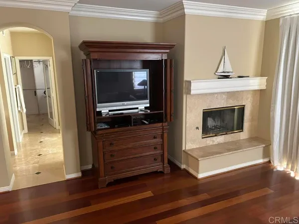 a bathroom with double vanity sinks and a bathtub