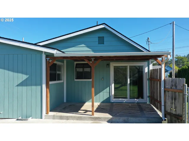 a open area with trees in the background