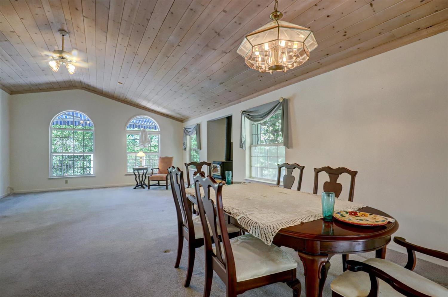 16479 Brewer Road Grass Valley, CA 95949 - Photo 6 of 33 a view of a dining room with furniture window and outside view